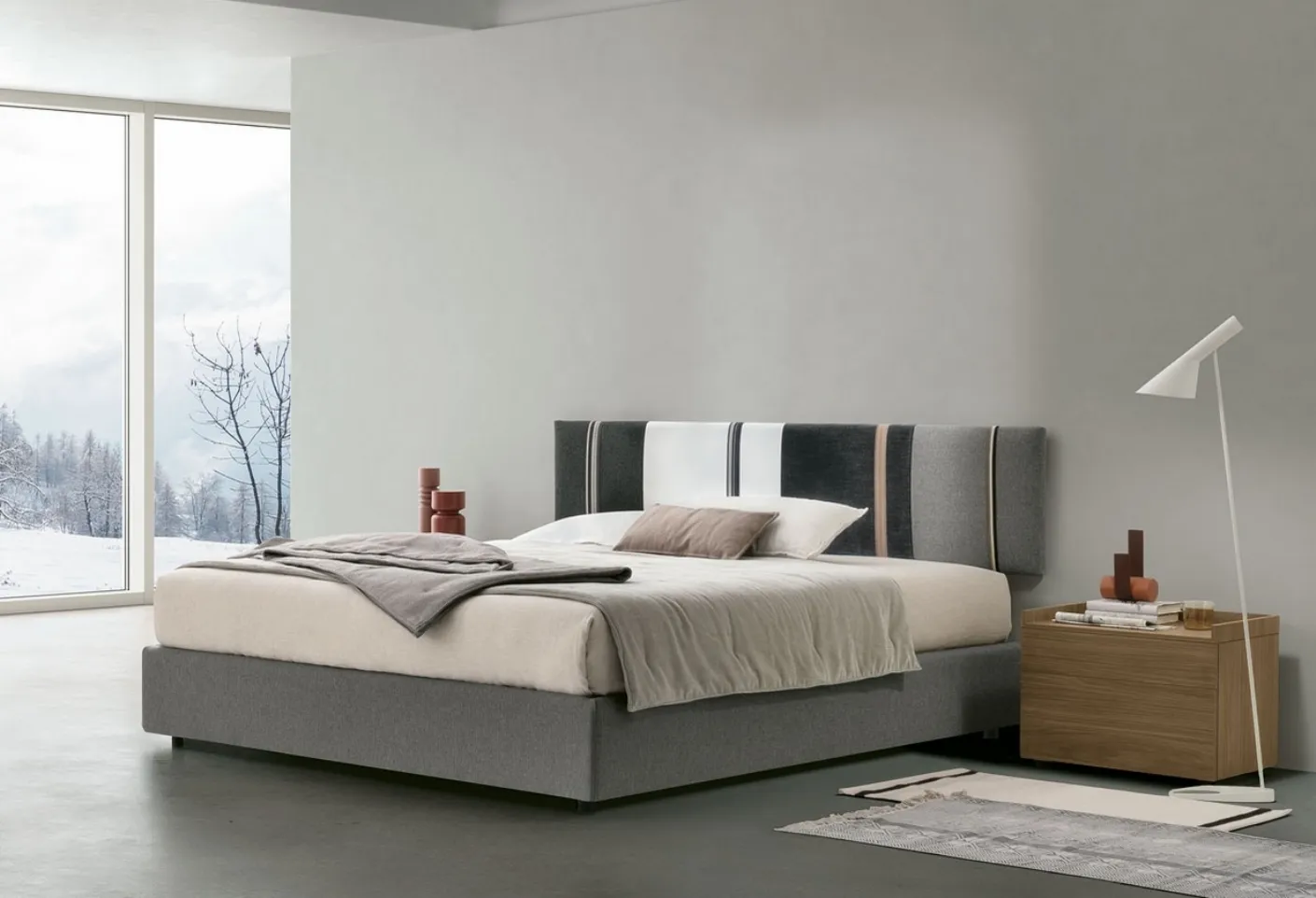 Letto sommier Diagonal con box contenitore e pannello testiera di Tomasella